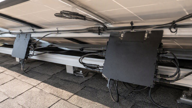 Hoymiles microinverters under rooftop solar array — PES Supply brand guide