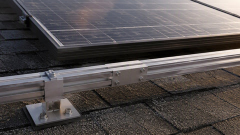 IronRidge aluminum rails and flashed mounts on pitched roof — PES Supply brand guide