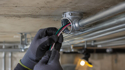 EMT conduit runs with multiple insulated conductors pulled through, exposed ceiling
