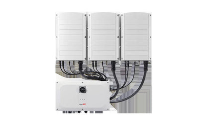 SolarEdge SE100K-US08IBNW4 commercial solar inverter front view with cables connected
