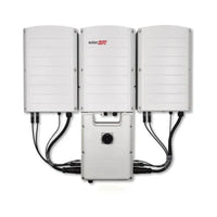 SolarEdge SE43.2K-USRP0BNU4 inverter with three white modules and connected cables, front view