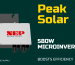 Rooftop solar panels with 580W microinverters installed, producing clean energy under direct sunlight on a clear day.